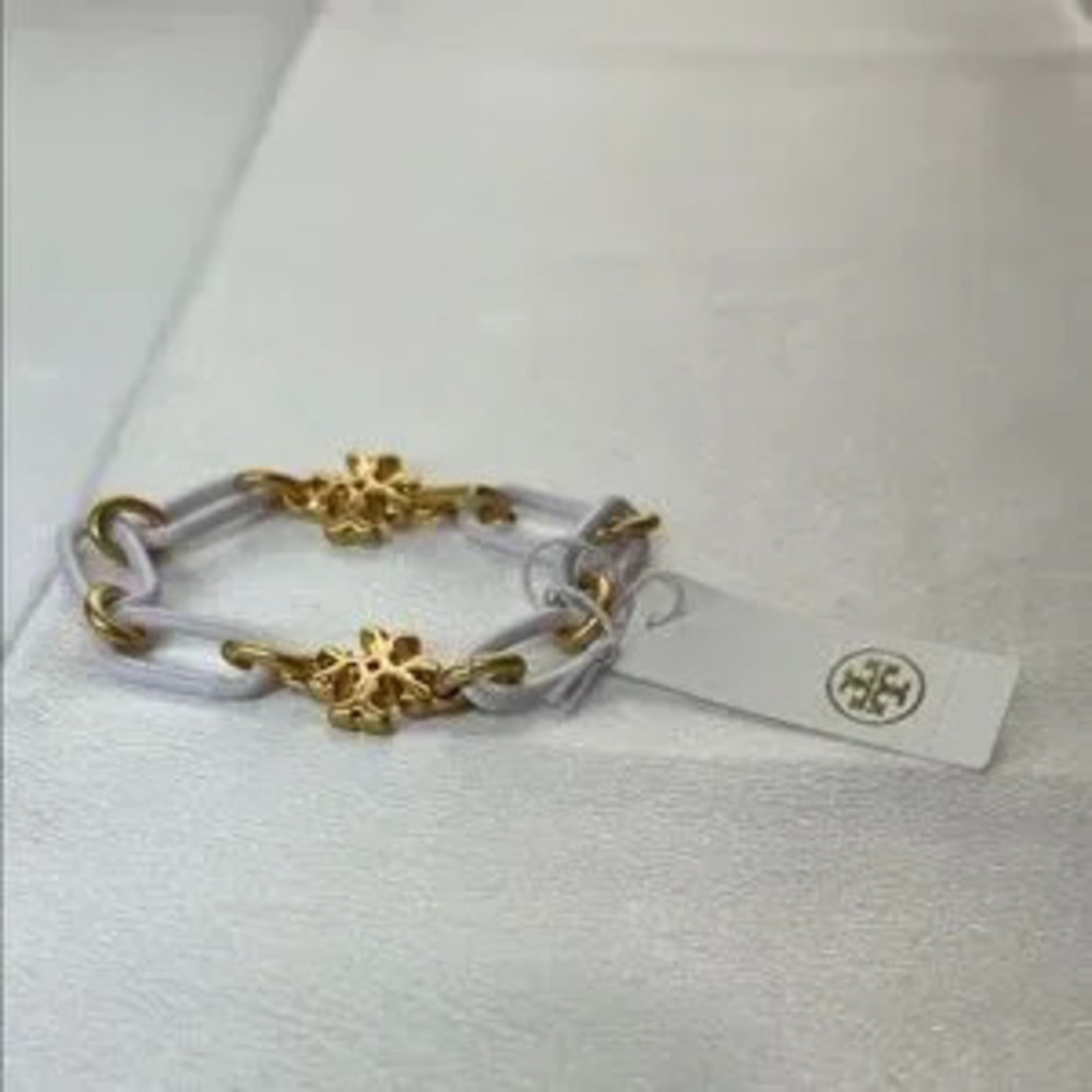 Brand new Tory Burch gold and white bracelet